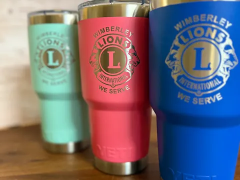Custom laser-engraved drinkware — mugs, tumblers, pint glasses